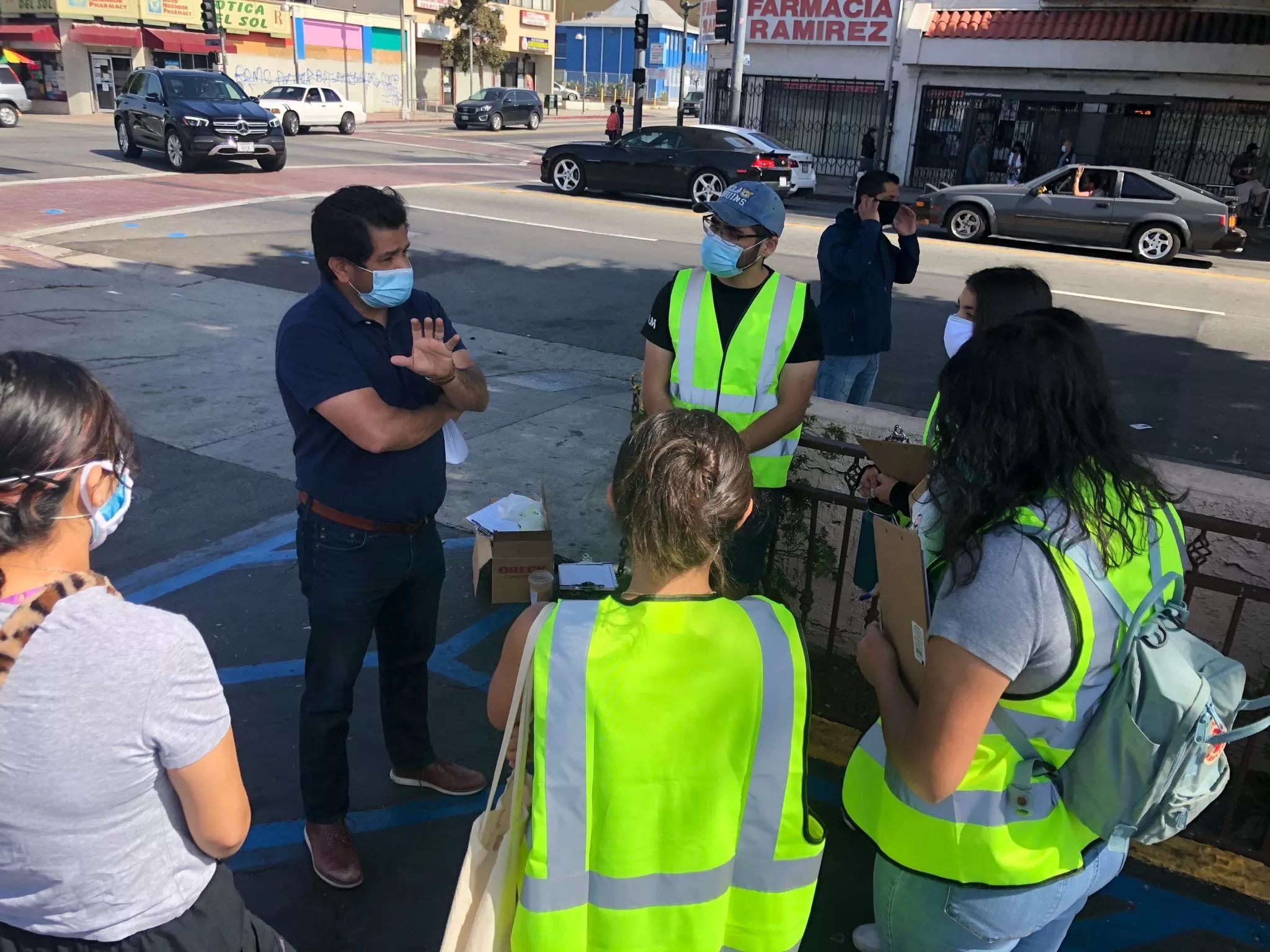 YMCA Teens supporting street vendor vaccination efforts!